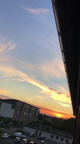 Wide-angle sunset gradient from a high vantage point