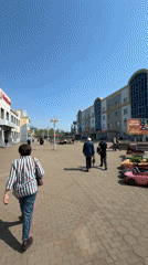 Morning street life documented across Birobidzhan city center