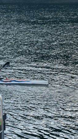 Kayaker spotted on Lyon river in bright afternoon conditions