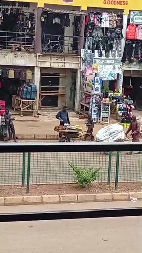 Market day in Bukuru: street trade, food prep, and everyday hustle