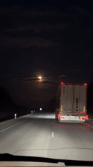 Dashboard camera captures nighttime truck encounter in Arkhara