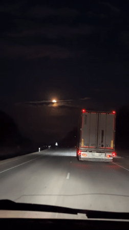 Dashboard camera captures nighttime truck encounter in Arkhara