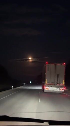 Dashboard camera captures nighttime truck encounter in Arkhara