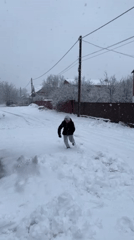 Winter snowfall activities documented in Abinsk, Russia residential area