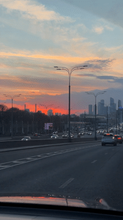 Moscow traffic and parking garage documented during sunset hours