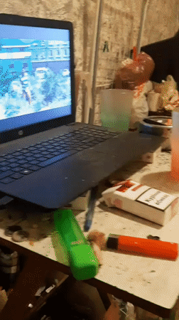 Late-night movie watching on a laptop in Kharkiv