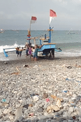 Fishing community at work on the Kota Agung shore