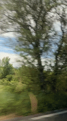 Family car journey through Châteauneuf-le-Rouge with child passenger