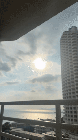 Rainy morning weather observed from Pattaya high-rise balcony