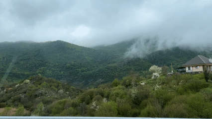 Traveler captures scenic mountain vista from vehicle in Montenegro
