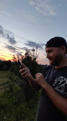 Couple documents sunset activities in rural Ukrainian village