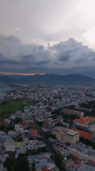 Nha Trang at dusk, from rooftops to street level