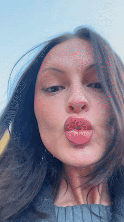 Woman makes faces outdoors in Tunbridge Wells Monday evening