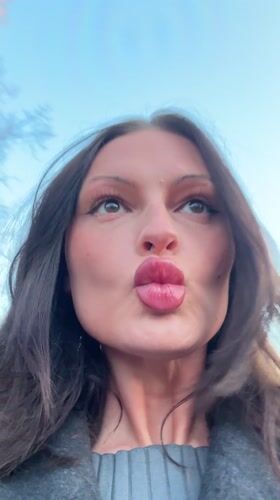 Woman makes faces outdoors in Tunbridge Wells Monday evening