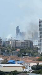 Smoke spotted rising behind buildings in Pattaya skyline