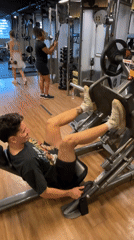 Man exercises at São Paulo gym during evening workout session