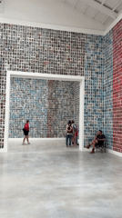 Venice gallery blanketed in thousands of small photographs