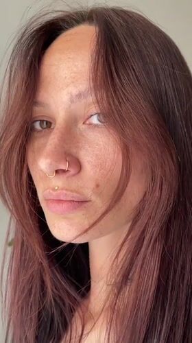 Close-up portrait series with piercings and curtain, Pervomaysky