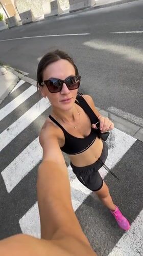 Selfie session on a Boreti sidewalk, July morning