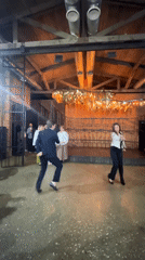Couple performs energetic dance in industrial room in Sokhumi