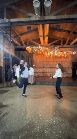 Couple performs energetic dance in industrial room in Sokhumi