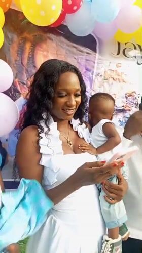 Child's first birthday party celebrated outdoors in Adankolo, Nigeria