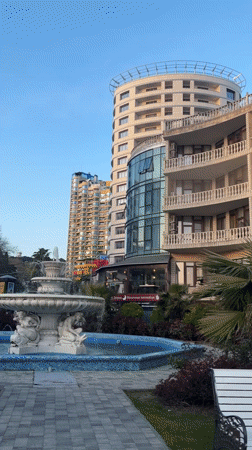 Family enjoys sunset evening at Sochi seaside promenade