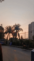 Evening street life documented across Dhaka during sunset hours
