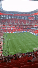 Football match observed at modern stadium in Rabat