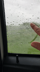Heart drawn on rainy car window in Inozemtsevo, Russia