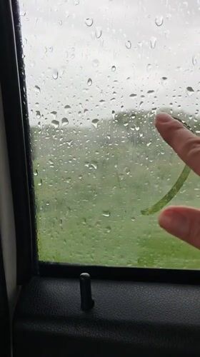 Heart drawn on rainy car window in Inozemtsevo, Russia