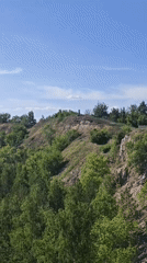 Memorial cross monument documented in Volzhskiy, Russia landscape views