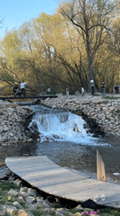 Park visitors gather at waterfall feature in Kazan