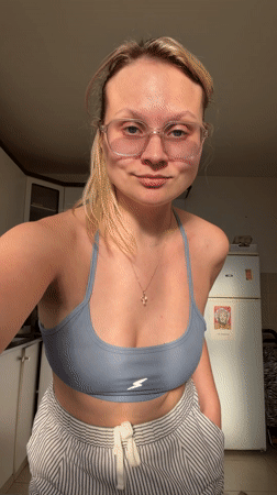 Woman celebrates with skiing-themed cake preparation in Tel Aviv kitchen