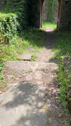 Tourist explores historic Eberbach castle ruins and scenic overlooks