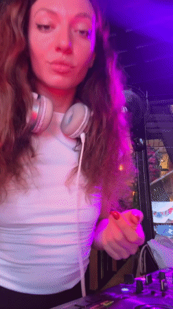 DJ works the booth at a Ko Samui club night