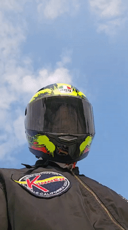 Motorcyclist with distinctive gear documented in Cam Lam, Vietnam