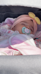 Baby sleeps peacefully in stroller in Varna, Bulgaria