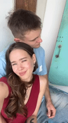 Couple films together indoors in Nha Trang on Valentine's Day