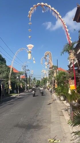 Ornate ceremonial structures line a street in Mengwi, Bali