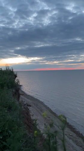 Coastal scene documented near Molchanovka under dark skies