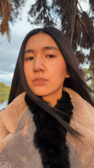Woman photographed during sunset photo session near Paris lake