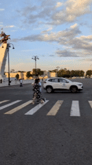 Bishkek's central square at golden hour, fountain and monument