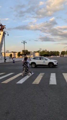 Bishkek's central square at golden hour, fountain and monument