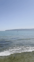 Clear spring day brings water sports, beachgoers to Varna coast