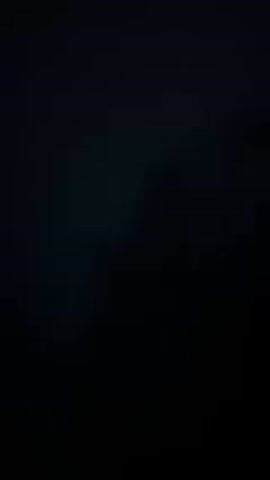 The video shows a dark, indistinct scene with subtle variations in shading. The overall impression is of darkness and limited visibility. No specific objects or entities are discernible.