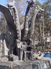 Dragon sculpture and cafe documented during Novosibirsk park visit