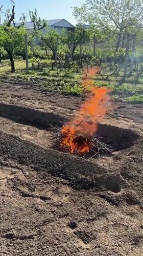 Small fire burns in garden pit in Stamboliyski, Bulgaria