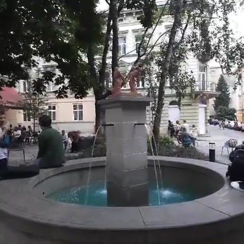 An evening in Lviv: street life, historic architecture, and a public gathering