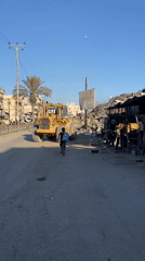 Scenes of debris, burning waste, and daily life in Gaza